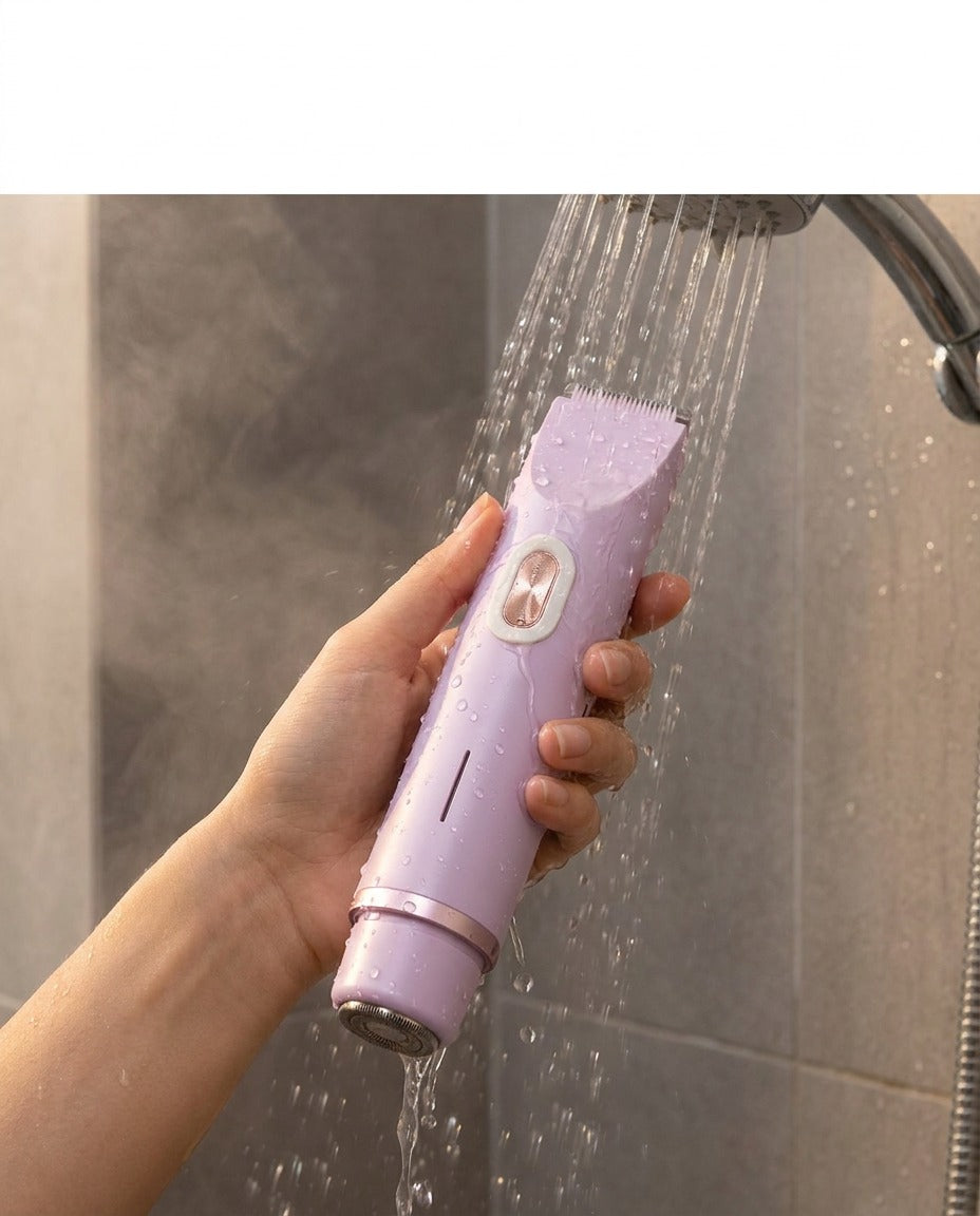 The lilac bikini trimmer held under running shower water, showing it is waterproof and can be used wet