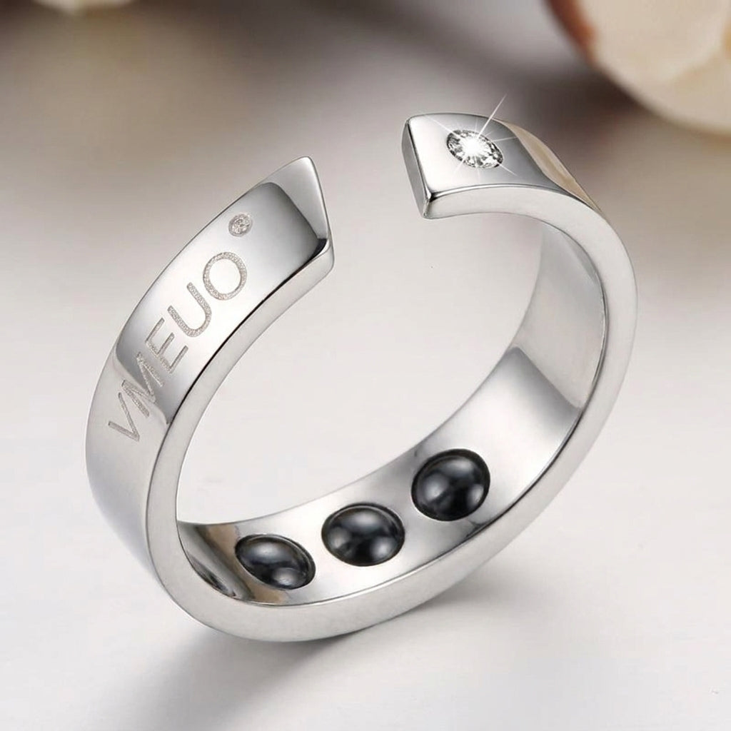 Hush Nights ring — detail macro showing VMEUO engraving and acupressure beads